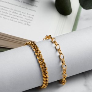 Elegant Gold Bracelets on Minimalist Display