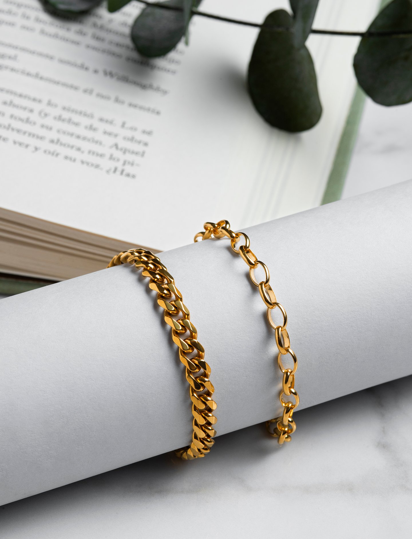 Elegant Gold Bracelets on Minimalist Display
